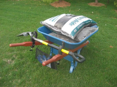 Grizzly Grip Wheelbarrow Tool Holder with Mesh Bag, Secures Tools To Wheelbarrow - Image 1 of 4