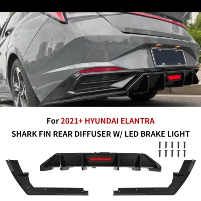 Didduser trasero con luz de freno LED para Hyundai Elantra 2021+ aspecto de carbono aleta de tiburón Foto 1 de 4
