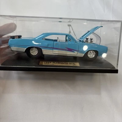 TootsieToy 1969 cuerpo duro Plymouth GTX 1:32 con estuche de plástico fundido a presión Foto 1 de 4