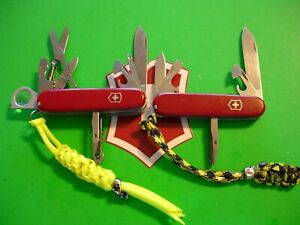 NTSA LOT of 2 VICTORINOX SWISS ARMY PKT KNIVES ONE IS  EXPLORER & ONE IS TINKER 