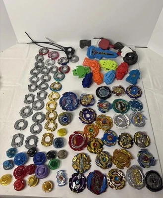 Enorme Lote BEYBLADE - Ruedas Metal + Tapas + Lanzadores - Colección Mixta LEER ⚠️ Foto 1 de 4