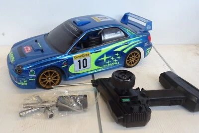 Subaru Impreza WRC 2002 Tamiya 1/10 engine rc - Immagine 1 di 4