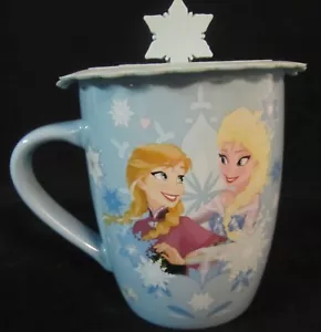 NUEVA Taza Azul Congelada de los Parques Disney con Tapa Anna y Elsa - Imagen 1 de 3