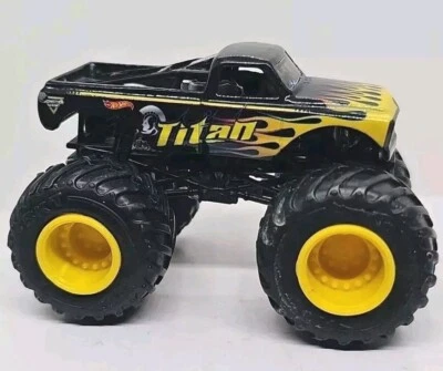 Hot Wheels Monster Jam TITAN Black & Yellow 1:64 Diecast Chevy C10 Monster Truck - Image 1 of 4