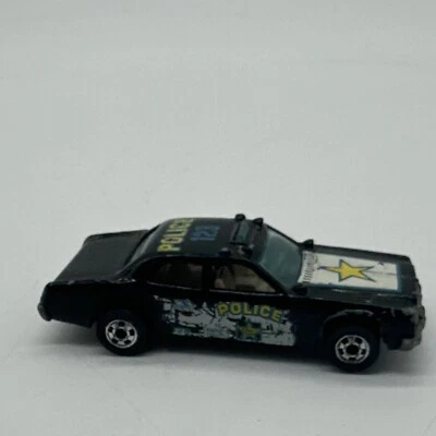 Coche de policía Hot Wheels 1977 vintage #123 estrella amarilla negro diecast Malasia 1/64 Foto 1 de 4