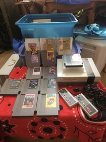 Nintendo nes two controllers  And Games.