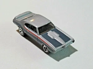 Hot Wheels '69 Pontiac GTO grau Team: Muscle Mania 2008 lose Malaysia 1:64 - Bild 1 von 10