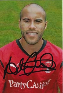 LEYTON ORIENT HAND SIGNED ADAM CHAMBERS 6X4 PHOTO 4. - Picture 1 of 1