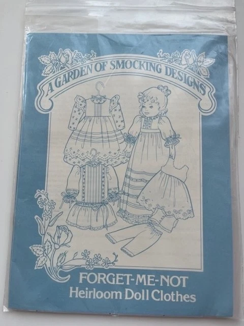 A Garden of Smocking Designs Forget Me Not Heirloom Doll Clothes Sewing Pattern - Image 1 of 2