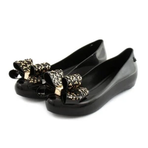 Melissa Ultragirl Sweet XVI schwarze Gummi-Flats mit Schleife Größe 10M goldfarbene Damenschuhe - Bild 1 von 6