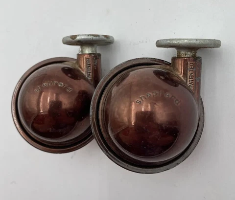 Shepherd Roller Ball Caster Wheels Pair Dark Brown Copper Color Lot Of 2 Vtg 2" Cover