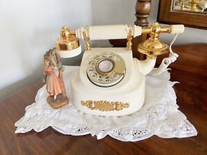 Téléphone vintage fantaisie boudoir or système cloche cadran