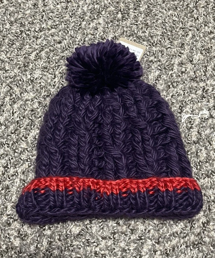 Gorro Merrell Trailhead Pom tejido púrpura y rojo Foto 1 de 1