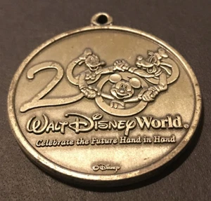 2000 Walt Disney World® Celebrate the Future Hand in Hand Coin Medallion - Picture 1 of 5