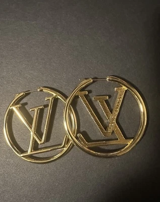 gold hoop earrings  - Image 1 of 3