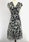 ECI New York Silk Floral Dress Womens 4 Black White Sequins Back Tie Midi Lined