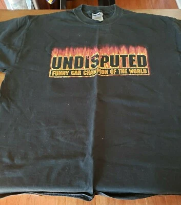 CAMISETA NEGRA NHRA JOHN FORCE "CAMPEÓN INDISCUTIBLE DE COCHES DIVERTIDOS DEL MUNDO" TALLA M Foto 1 de 3