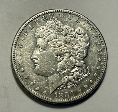 1883  S MORGAN DOLLAR AU DETAILS - Image 1 of 2