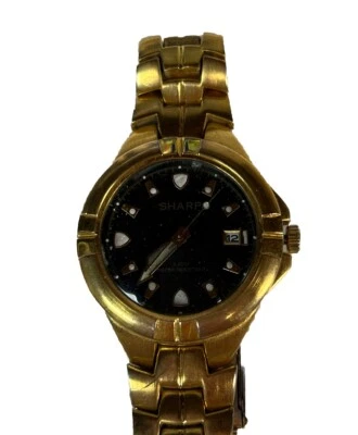 Reloj Sharp para hombre tono dorado 9” esfera negra batería nueva  Foto 1 de 4