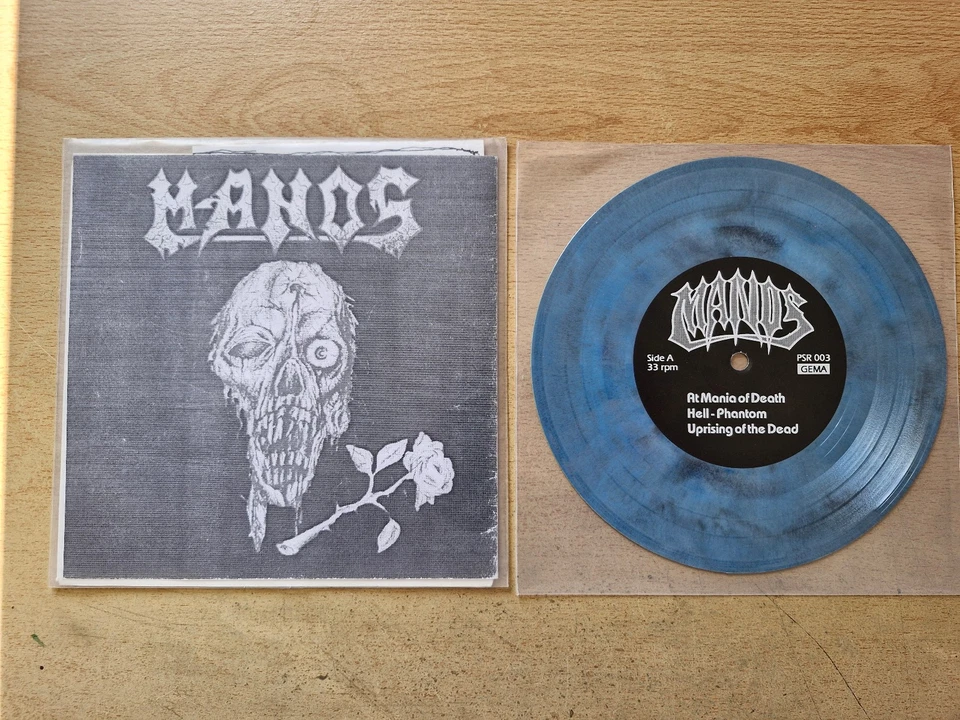 Manos  - Manos 7" Blue Marbled Vinyl - Bild 1 von 1