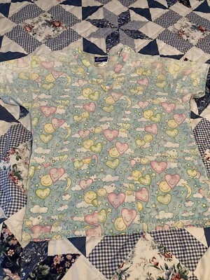 Women’s Crest Multi Color Pattern Scrub Top Size XS  - Image 1 of 4