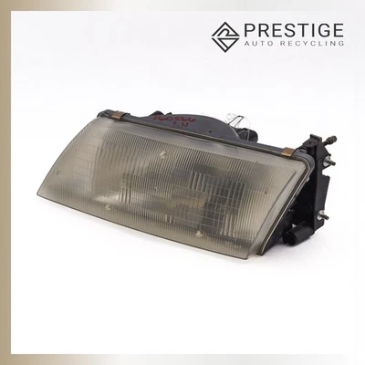 Faro izquierdo Nissan Sentra 200SX 1995-1999 26060-1M325 Foto 1 de 4