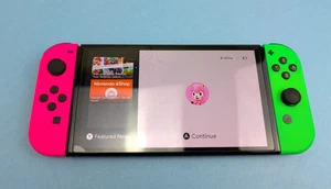 Nintendo Switch Console OLED 64 GB Neon Pink and Green Joy-Con HEG-001 Excellent - Picture 1 of 10