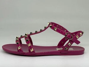 Sandalias Valentino Rockstud con tachuelas de PVC gladiador con correa en T gelatina plana $490 - Imagen 1 de 12