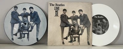 Love Me Do/PS I Love You By The Beatles. White Vinyl & Blue picture Disc 7” - Image 1 of 4