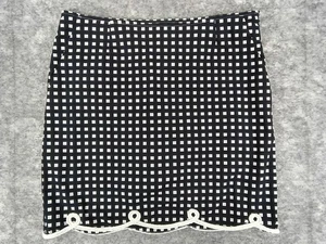 Falda de golf Golftini para mujer 8L The Ace con dobladillo festoneado con cuerda negra blanca - Imagen 1 de 12