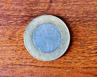 India - Error - 10 Rs Bimetallic Coin - Blank (unprinted) planchet - Mint Error - Image 1 of 2