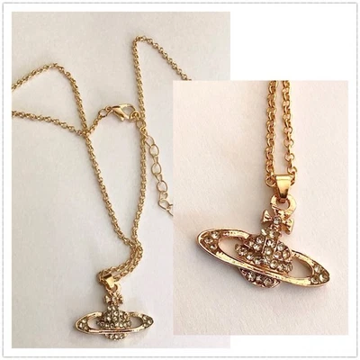 Goldf . Modeschmuck Halskette für Damen Modern Style m. Strass Logo🎀 - Bild 1 von 4