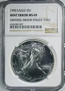 1990 American Silver Eagle - Mint Error Obverse Struck Through - NGC MS-69 - Picture 1 of 4