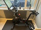 Peleton Exercise Bike With Shoes, Weights, Floor Mat & Swivel Screen