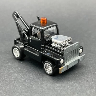 Johnny Lightning The Lost Toppers 1971 Tow'd Tow Truck Black Diecast 1/64 Loose - Image 1 of 4