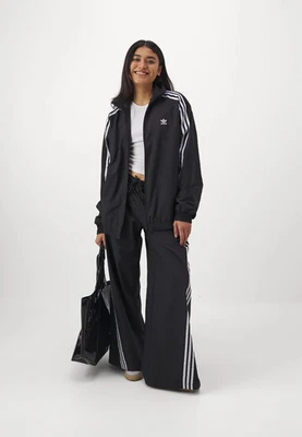 Adidas Oversized 3 Stripe Retro Adilenium Pants Small. Medium, Large, XL - Image 1 of 4
