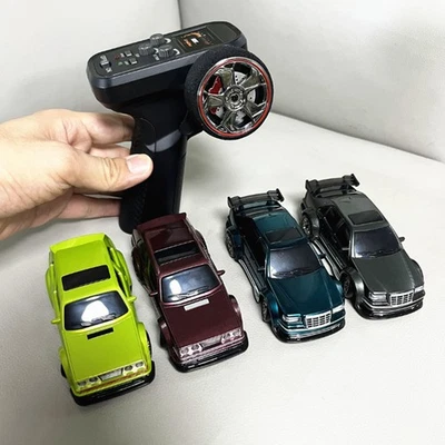 1:43 4WD RC Drift Car mit Gyroskop 2,4G Rennwagen Kinderspielzeug Auto Spielze9E - Bild 1 von 4