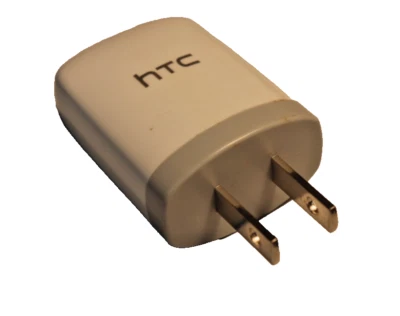 CARGADOR DE VIAJE UNIVERSAL HTC ADOPTADOR -TC-U250 - BLANCO/GRIS Foto 1 de 3