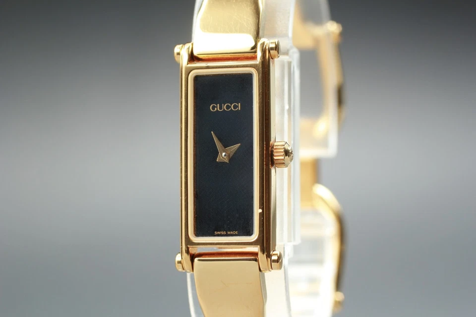 [Casi COMO NUEVO] Reloj para mujer vintage GUCCI 1500 13 mm dorado esfera negra rectangular Qz Foto 1 de 4