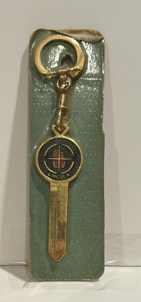 Llave en blanco Lincoln Continental vintage con escudo de oro sin cortar 1965-1967 chapada en oro sin usar, en caja Foto 1 de 3
