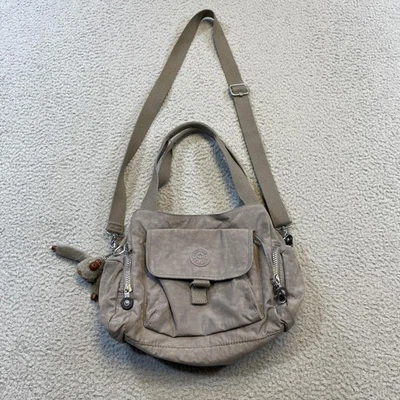 Bolso Bandolera Kipling Mujer Gris Nylon Cartera Mono Llavero Mediano Foto 1 de 4