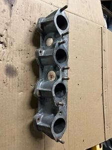 1977-1979 BMW E21 320i M10 Early Lower Intake Manifold Mount OEM 1257024 - Bild 1 von 4