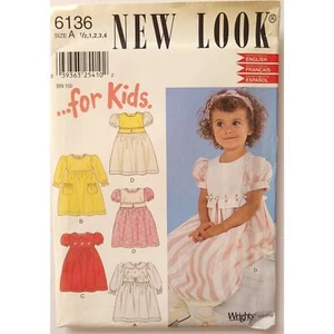UNCUT Kids' Empire Waist Dress Sewing Pattern, English Espanol Simplicity 6136 - Picture 1 of 6