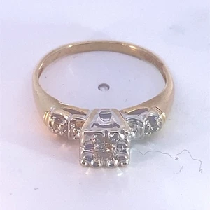 Lady's Diamond Fashion Ring 3 Diamonds .05 Carat T.W. 14K Yellow Gol (MI1067621) - Picture 1 of 13