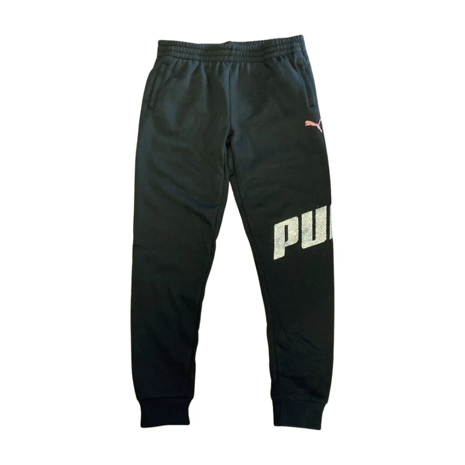 Pantalones deportivos Puma para niños y niñas negros con letras PUMA plateadas brillantes precio de venta sugerido por el fabricante $36 nuevos con etiquetas Foto 1 de 1