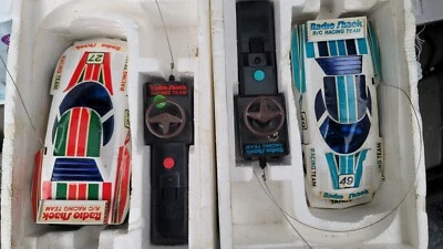 Vintage Two Tandy Radio Shack Radio Controlled RC Car Silver Racer in Styrofoam  - Image 1 of 4