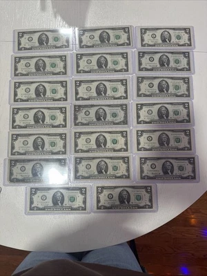Assortment Of 39 Two Dollar Bills In Plastic Sleeve - Image 1 of 4
