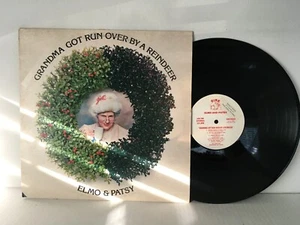 Elmo & Patsy - Grandma Got Run Over By A Reindeer - Epic Records (1984) LP - Picture 1 of 2