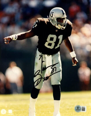 TIM BROWN SIGNED AUTOGRAPHED 8x10 PHOTO OAKLAND RAIDERS LEGEND BECKETT BAS - Image 1 of 2