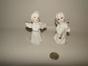 Juego de 2 ángeles chinos de hueso fino tocando música, blanco con reflejos dorados - Imagen 1 de 6